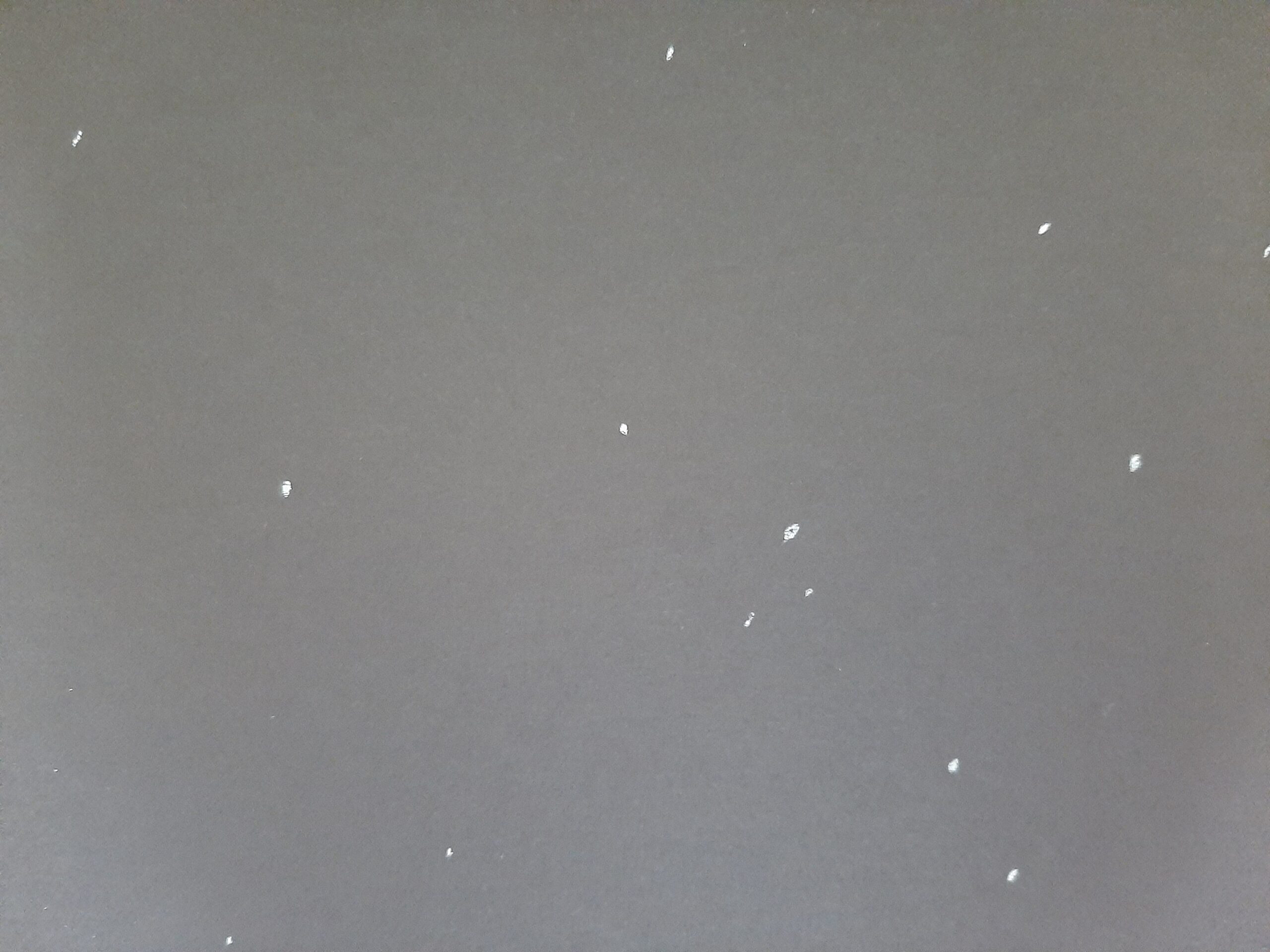 White spots on a black background